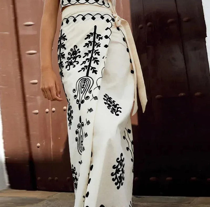 Maria - Conjunto estampado de top sem mangas e saia fluida