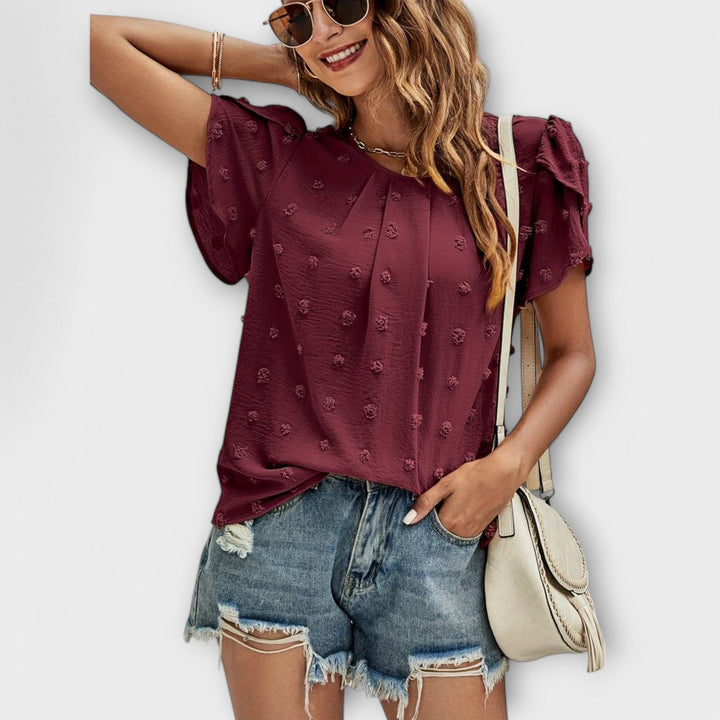 Blusa de mangas florais